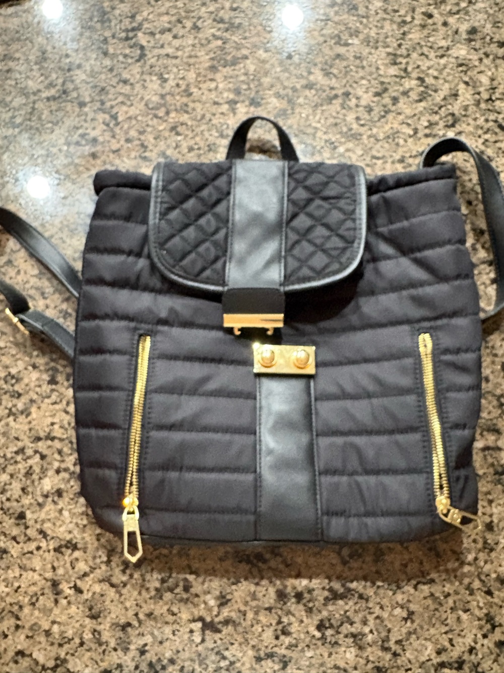 Gianni Bini Black Quilted Backpack Gold Hardware Buckle Closure Inner Pockets